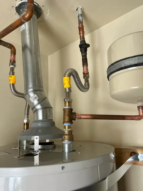 Water heater installation and plumbing repair in The Towneship